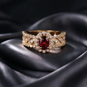 Oval Red Stone Statement Ring, Gold Tone Halo Design with Vintage Inspired Openwork Band