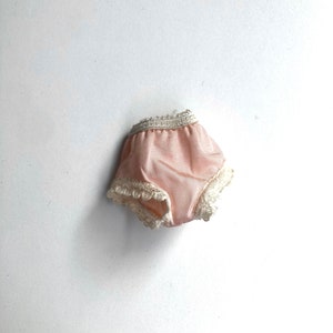 classic 60’s barbie pink panties with white lace trim and two tiny holes