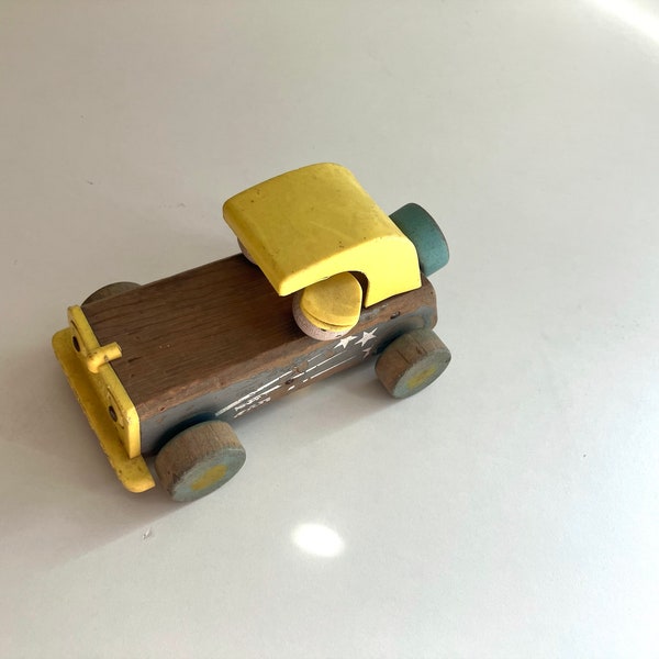 fisher price toys sports car with moving heads connected to rolling wheels chippy paint wood toy car