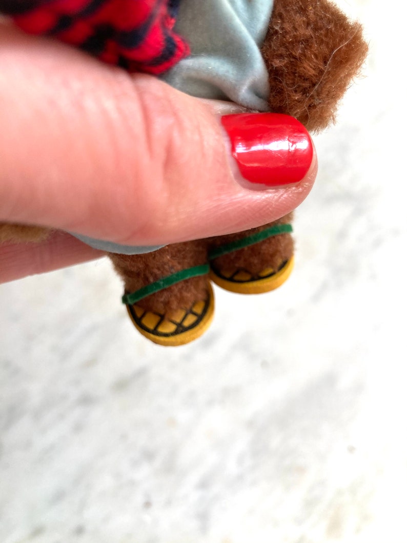 vintage plush bear in snow shoes ornament