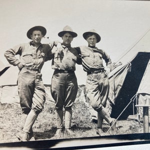 old black and white photo postcard of three soldiers