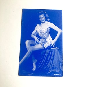 vintage pinup female photo ephemera card with blue tones