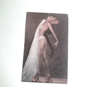 vintage pinup female photo ephemera card with woman bending backwards