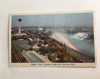 vintage souvenir postcard american falls and rainbow bridge skylon tower niagara falls canada