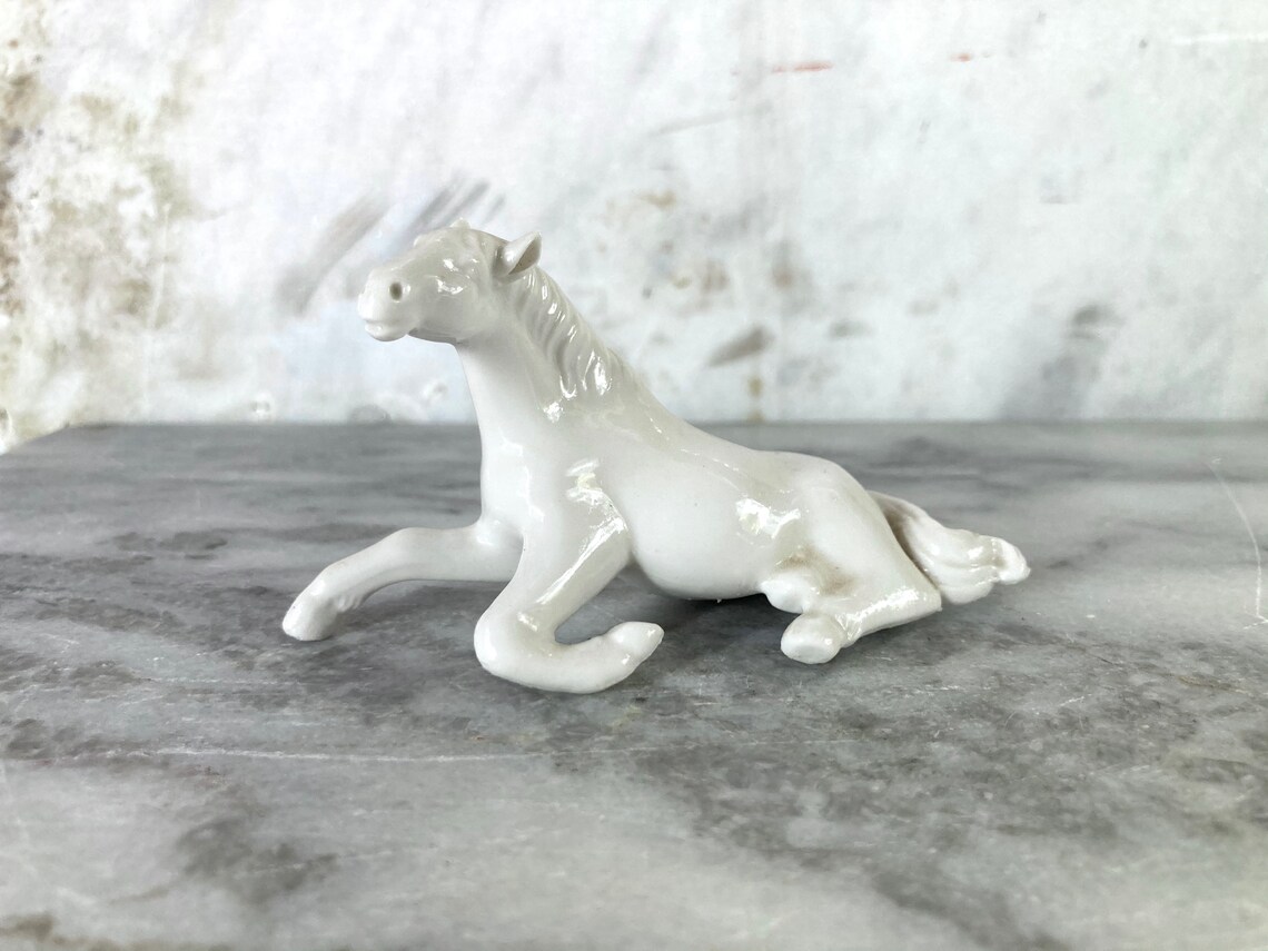 white porcelain horse statue