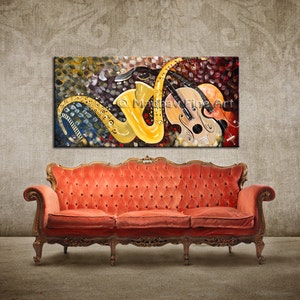 May include: A colorful abstract painting of a saxophone and violin on a textured background. The painting is displayed above a red velvet sofa with ornate wooden legs.