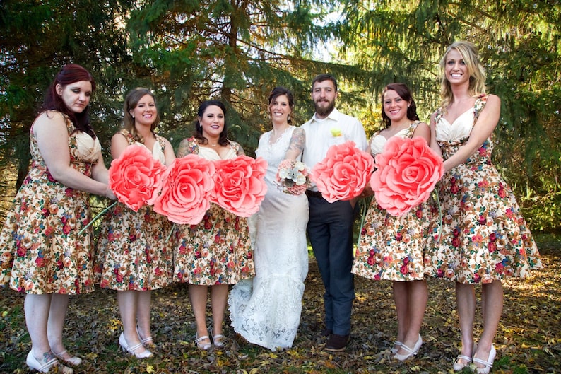 Giant paper flower with long stem. Bride bridesmaid ...