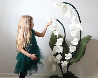 Giant lily of the valley. Alice in Wonderland photo prop. Garden party backdrop. Storefront shop window large white flowers