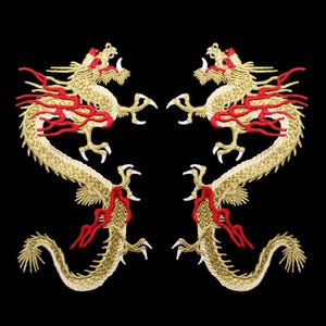 May include: Two mirrored embroidered dragon patches featuring gold thread bodies with red accents on the mane and tail. Each dragon has white claws and teeth, with a long serpentine body curving in a symmetrical shape against a black background.