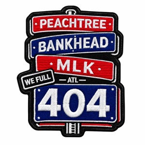 May include: An embroidered patch featuring stacked street signs in red, white, and blue. The signs read PEACHTREE, BANKHEAD, MLK, WE FULL, and 404 ATL. The design has a black border and white lettering, mimicking the style of city street signage.