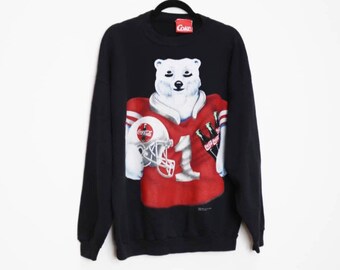 Coca cola pullover - Unser Gewinner