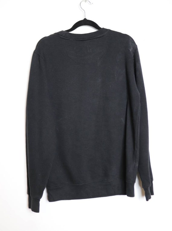 Black sports jumper sales