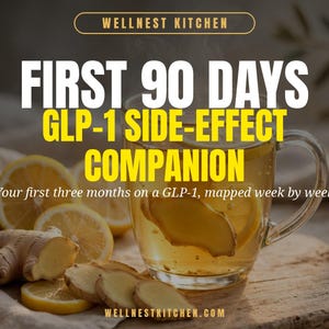 Op de afbeelding: Een glazen mok gevuld met thee met schijfjes citroen en gember, vergezeld van verse gember en citroenschijfjes. De tekst luidt: WELLNEST KITCHEN, FIRST 90 DAYS GLP-1 SIDE-EFFECT COMPANION, Your first three months on a GLP-1, mapped week by week.
