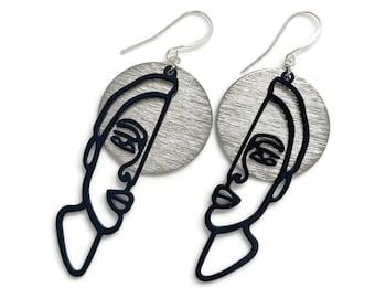 Unique Brushed Silver Disc Earrings with Abstract Face Design – Modern Statement Jewelry