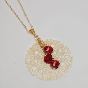 Round gold necklace with filigree and ruby Swarovski crystal | July birthstone | elegant gold pendant