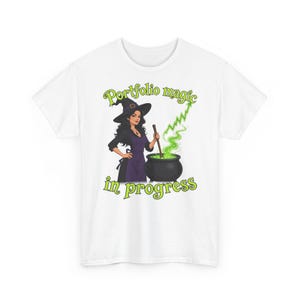 Witch brewing a market portfolio in her cauldron T-Shirt - Portfolio magic in progress | Funny Graphic Tee | Unisex Gift Shirt