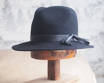 Isabel: Black men's weight felt fedora with 7/8" black trim and fringe