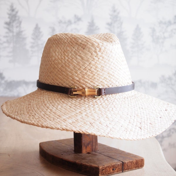 June:  Doubled natural raffia trilby crown with floppy brim and bamboo finding with chocolate leather trim