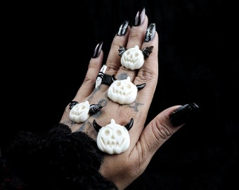 Hand Carved Bone Pumpkin Pendant: Creepy Cute Halloween Charm