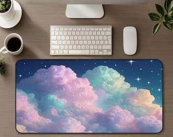 May include: A rectangular desk mat featuring a vibrant night sky scene with large, fluffy clouds in shades of pastel pink, purple, and teal. The dark blue background is filled with scattered white stars of varying sizes, creating a celestial effect.