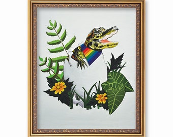 May include: A painting of a small alligator wearing a rainbow-colored scarf, emerging from a cracked white egg. The alligator is surrounded by green foliage and yellow flowers.