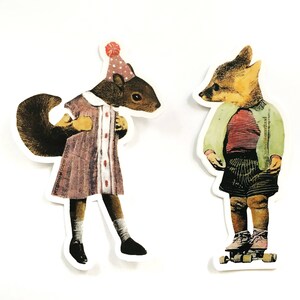 May include: Two whimsical die-cut stickers featuring anthropomorphic animals. One is a squirrel wearing a dress and party hat, the other a fox on roller skates. The stickers have a vintage, storybook aesthetic.