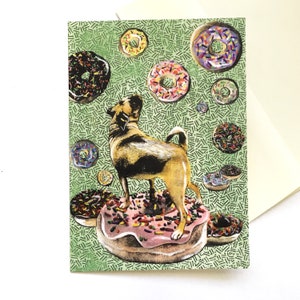 May include: A brown and black pug dog standing on a pink and white donut with sprinkles. The dog is looking up at a cluster of donuts with sprinkles in the air. The background is a green pattern.