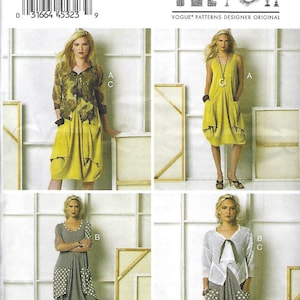 May include: A sewing pattern for a dress with a gathered skirt. The pattern includes three different views of the dress, each with a different style of top. The pattern is from Vogue Patterns and is designed by March Tilton.