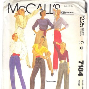May include: A sewing pattern for pants with a waist size of 20 inches and a size 34. The pattern includes instructions on fitting pants. The pattern is from McCall's and is for a miss size. The pattern is from 1980.