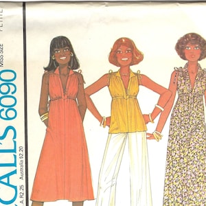 May include: Vintage McCall's 6090 sewing pattern showing three dress and top designs. The illustrations depict a sleeveless orange dress, a yellow top with white trousers, and a floral print dress. The pattern is for petite miss sizes.