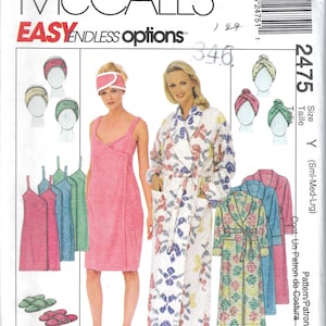 May include: McCall's 2475 sewing pattern for a wrap dress, robe, headband, and slippers. The pattern includes illustrations of a solid pink wrap dress, a patterned robe, and various color options for accessories in size Y.