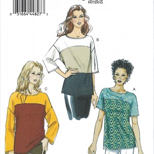 May include: A sewing pattern for a top with three different variations. The pattern is for sizes X-Small, Small, and Medium. The pattern is from Vogue Patterns and is labeled "Very Easy".