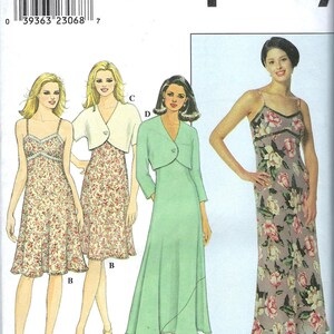 May include: Simplicity sewing pattern 8761 featuring women's dresses and a jacket. The dresses have floral prints and spaghetti straps. The jacket is a light green color. The pattern includes sizes 16, 18, and 20.