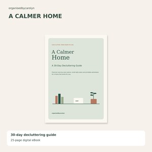 May include: A digital eBook titled A Calmer Home, A 30-Day Decluttering Guide. The cover is light green with dark green text, featuring a small graphic of books, a box labeled KEEP, and a potted plant on a thin horizontal line.