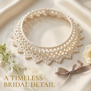 May include: A cream-colored crocheted collar necklace featuring a delicate lattice pattern adorned with small white pearls along the edges and center. The text A TIMELESS BRIDAL DETAIL is printed in gold lettering at the bottom of the image.