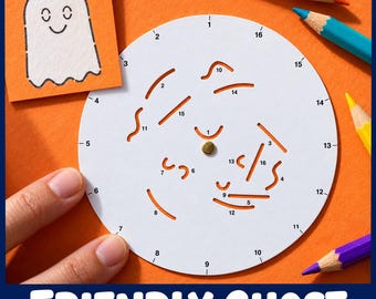 May include: A white circular stencil with numbered cutouts and a central brass fastener, accompanied by an orange square card featuring a hand-drawn ghost illustration. The stencil includes various curved and straight slots labeled with numbers 1 through 16.
