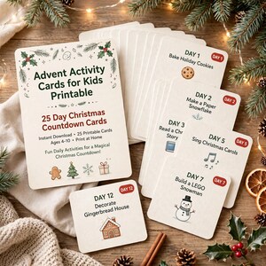 May include: A set of 25 printable Advent activity cards for kids with a Christmas countdown theme. The main card features the text Advent Activity Cards for Kids Printable and 25 Day Christmas Countdown Cards, with smaller cards showing daily tasks like Bake Holiday Cookies, Make a Paper Snowflake, Read a Christmas Story, Sing Christmas Carols, Build a LEGO Snowman, and Decorate Gingerbread House.