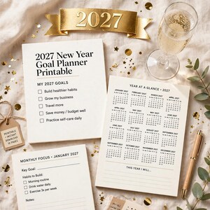May include: A 2027 New Year goal planner printable set featuring a goal list, a monthly focus sheet, and a year-at-a-glance calendar. The pages include text such as 2027 New Year Goal Planner Printable, My 2027 Goals, and Year At A Glance 2027.