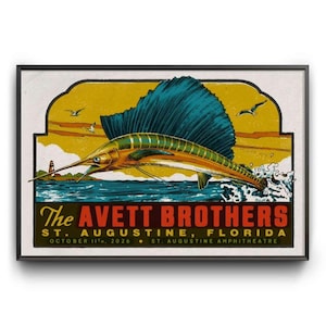 Könnte beinhalten: Ein rechteckiges Konzertplakat mit einem großen Segelfisch, der über blauem Wasser vor gelbem Hintergrund springt. Der Text lautet: The Avett Brothers, St. Augustine, Florida, October 11th, 2026, St. Augustine Amphitheatre.