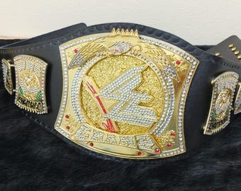 Cinturón de campeonato de lucha libre de oro, cinturón de título con correa de cuero negro, premio de campeón con diamantes de imitación.
