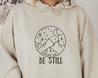 Sudadera cristiana "Be Still", regalo inspirador de fe.