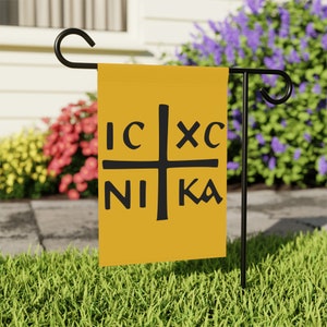 May include: A yellow garden flag with a black cross and the text "IC XC NI KA" in black.