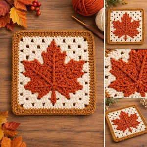 May include: A square crochet granny square featuring a central burnt orange maple leaf motif on a cream background, framed by a solid brown border. The design is worked in yarn with a visible texture, showcasing intricate stitch details.