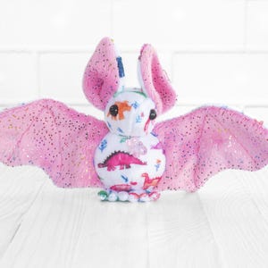 Pink Sparkle Dinosaur Bat Stuffed Animal Plush Toy