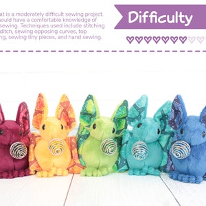 On the top is a banner which reads "Difficulty" and has 7 out of 10 hearts dark purple. Text describes the difficulty level (the same as in the product description) and a photo of a rainbow group of bats are below it.