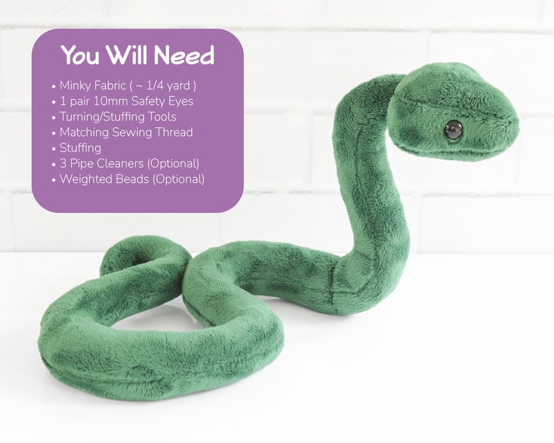 May include: A green plush snake toy with black safety eyes. The snake is curled up in a 'S' shape. The text 'You Will Need' is written in purple on a pink background. The text lists the materials needed to make the snake toy, including minky fabric, safety eyes, turning/stuffing tools, sewing thread, stuffing, pipe cleaners, and weighted beads.