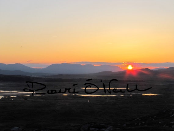 Summer Sunrise Over Mist Covered Lakes In Connemara with Jet Trails In a Yellow Sky Photograph on Canvas ready to hang