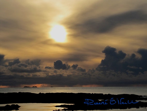 Winter Sunset With CloudsOn Atlantic Ocean