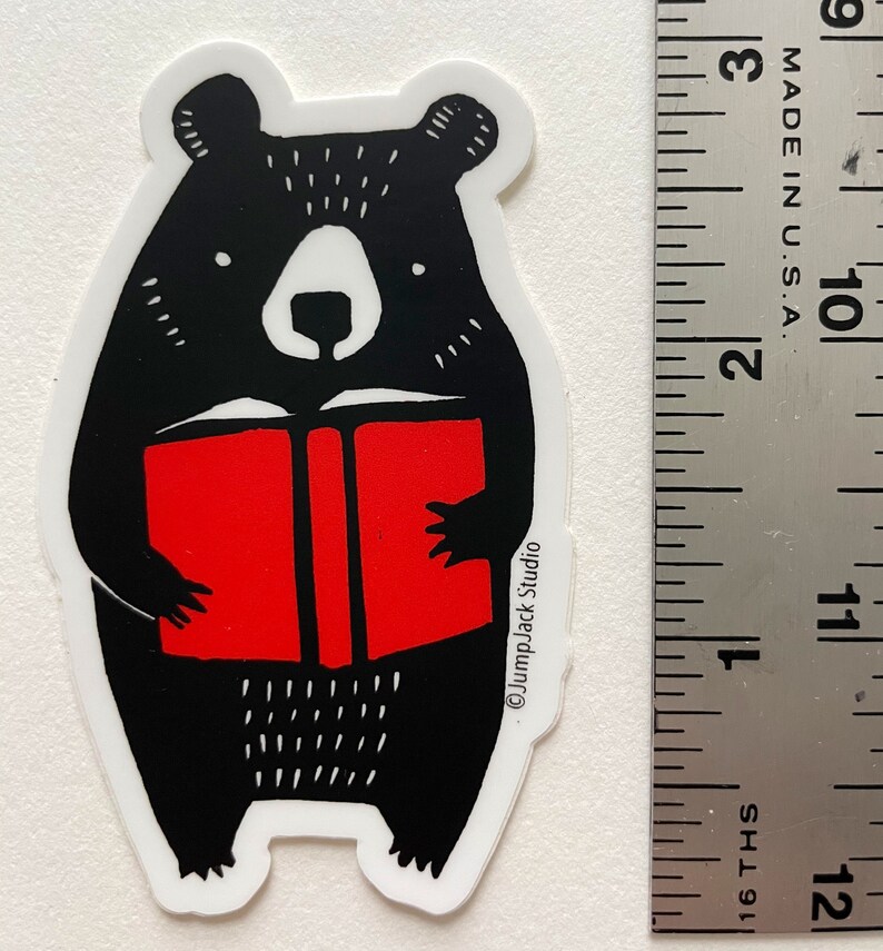 Bear reading red book 3 vinyl sticker image 1