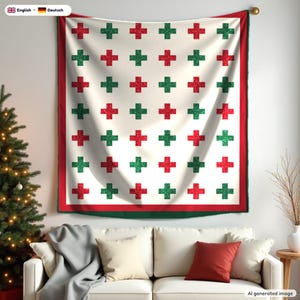 May include: A white wall tapestry featuring a repeating grid pattern of alternating red and green plus signs. The tapestry is framed by a solid red border and a thin dark green outer edge, creating a festive and symmetrical design.